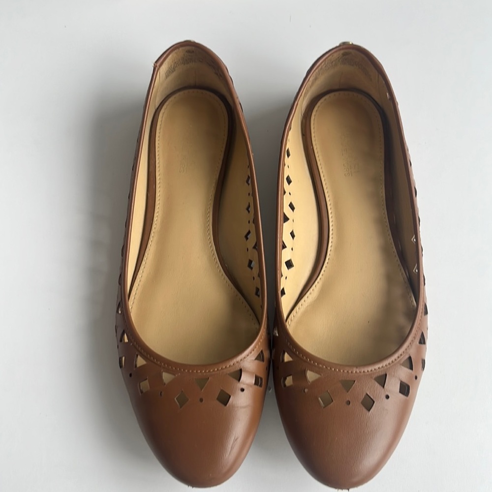 Michael Kors flats with cut out detail